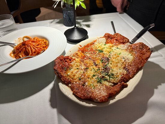 Vitolo signature dishes Vitello alla Vitolo (Veal Parmesan)Spaghetti BologneseMozzarella in Carrozza